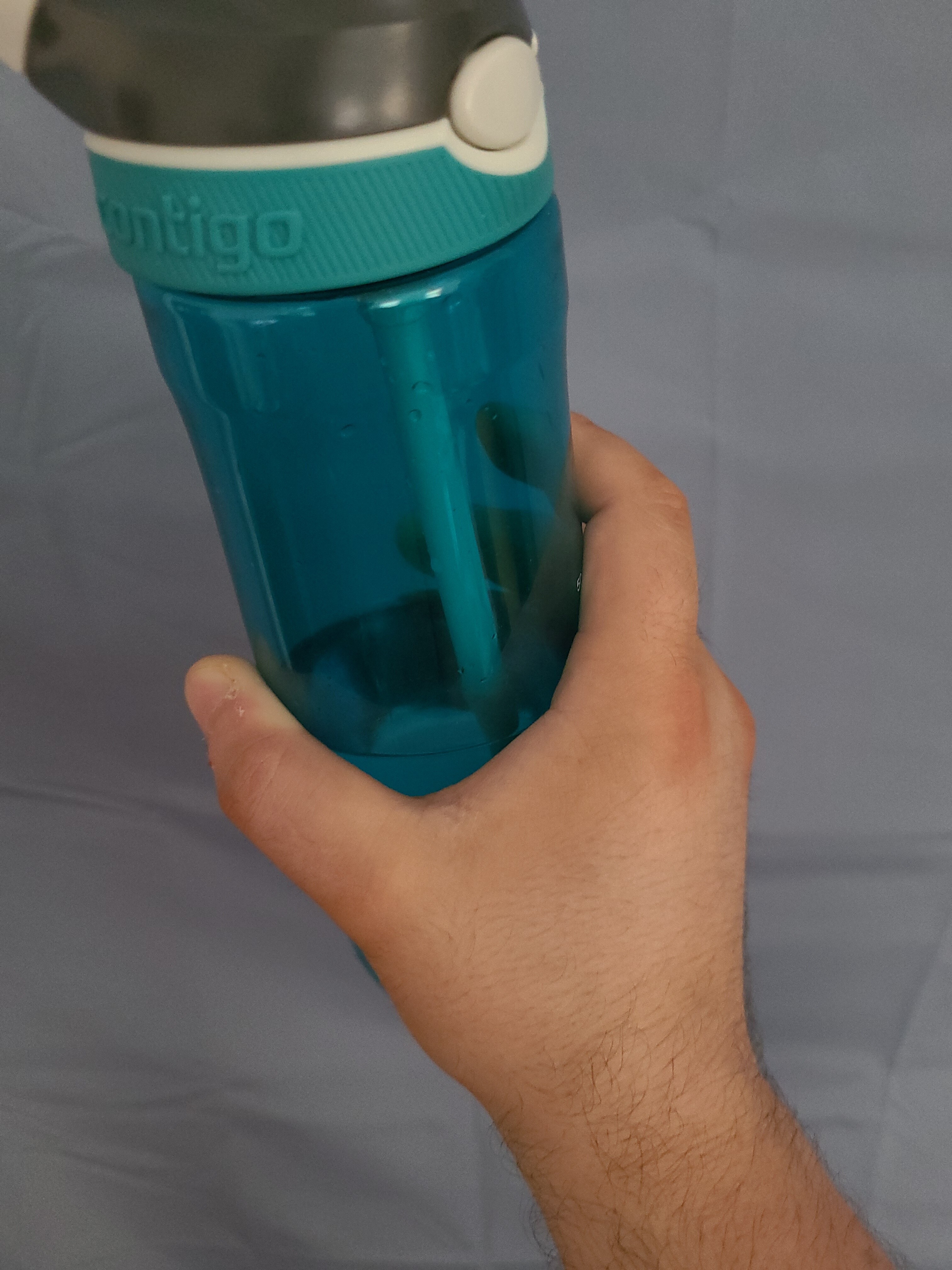 Grabbing a water bottle